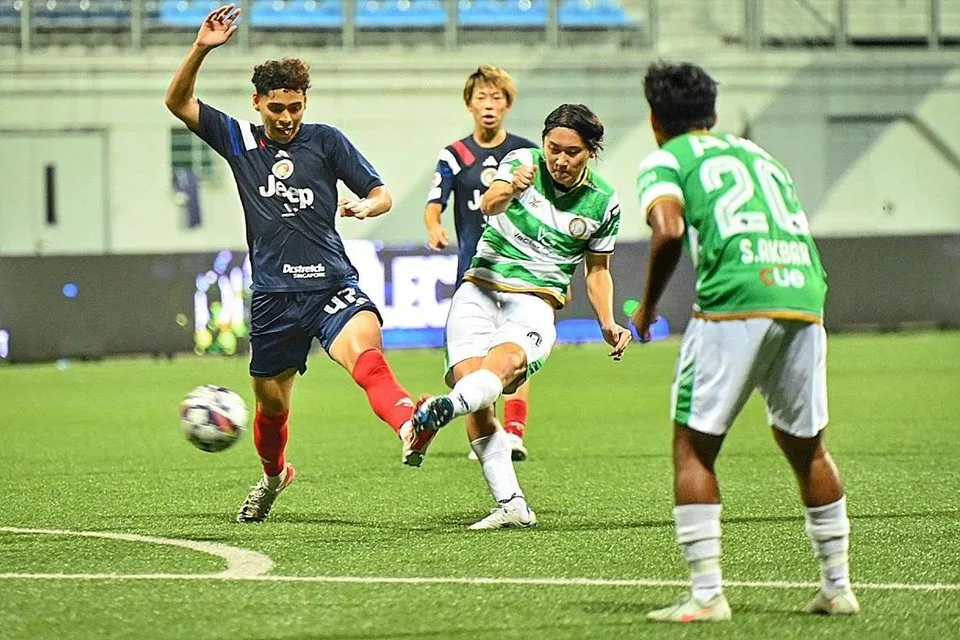 Geylang International striker Tomoyuki Doi (second from right) scored a record-breaking 44 goals in 32 games this season.